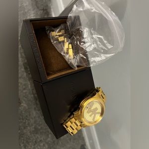 Michaels Kors watch in gold